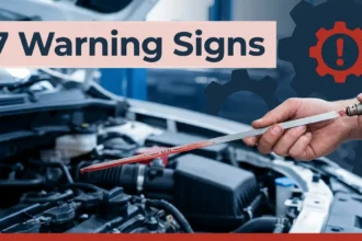 Illustration of a transmission dipstick being pulled out showing red fluid below the minimum line, with a warning icon and gear symbols, for a guide on how do you know when your transmission fluid is low